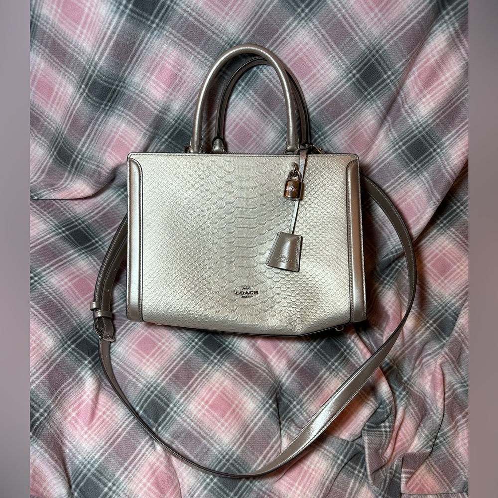 NWOT Coach Zoe Caryall in metallic snake.